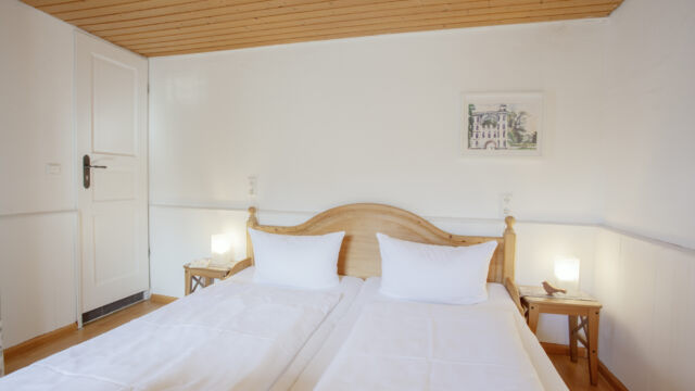 Familienzimmer Terrasse: Schlafzimmer mit Bett (Zimmer 2) Familienzimmer Terrasse: Schlafzimmer mit Bett (Zimmer 2)