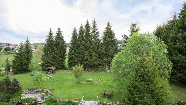 Doppelzimmer Gartenblick: Aussicht aus dem Fenster Doppelzimmer Gartenblick: Aussicht aus dem Fenster
