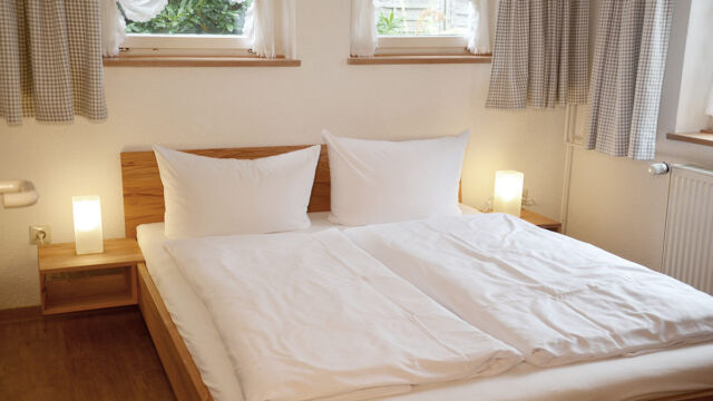 Ferienwohnung Garten: Bett Ferienwohnung Garten: Bett