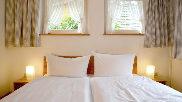 Ferienwohnung Garten: Bett Ferienwohnung Garten: Bett